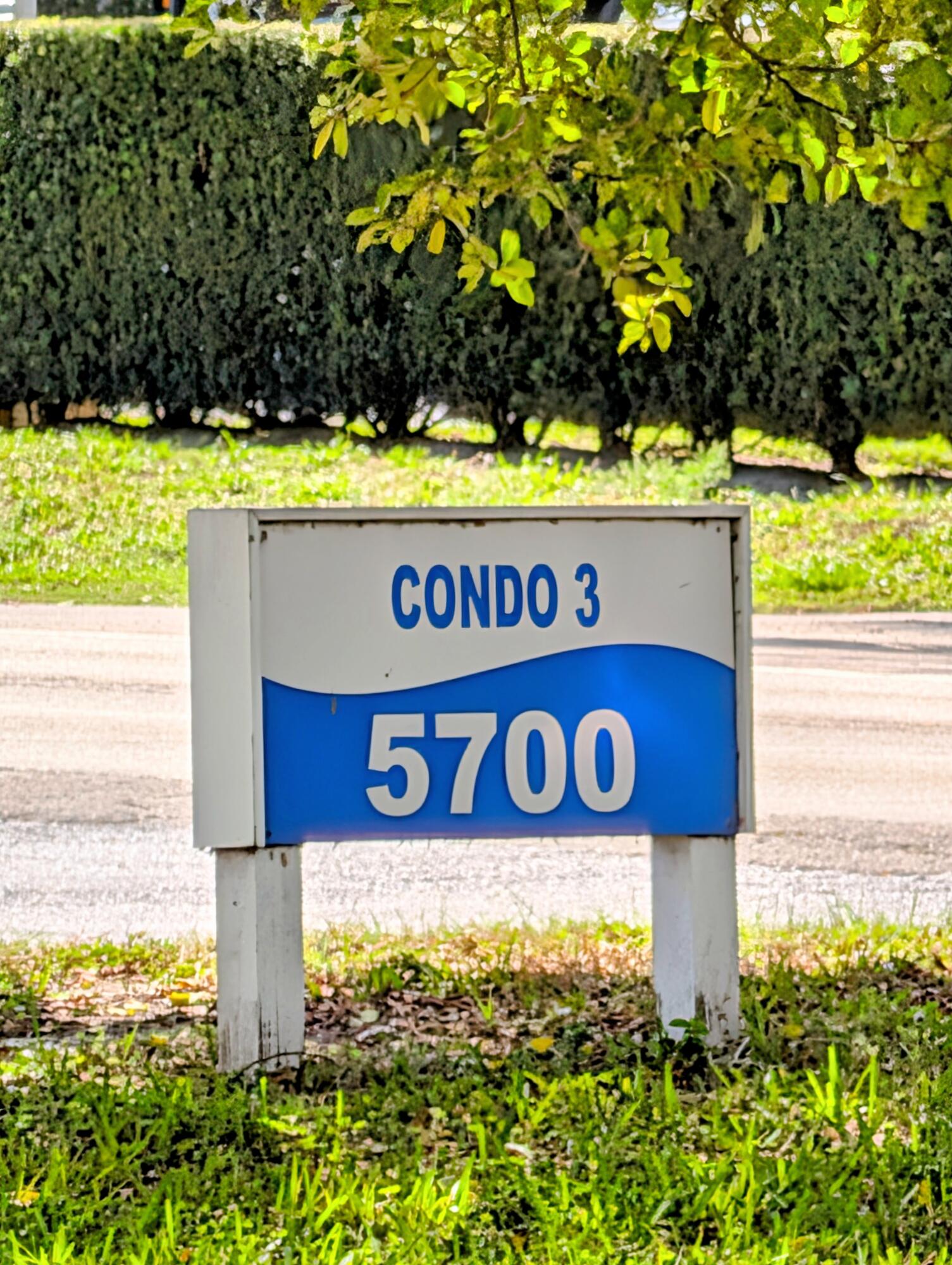 5700 Northwest 2nd Avenue, Unit 509 Boca Raton, FL 33487 - Photo 20 of 20 a sign that is on a brick wall
