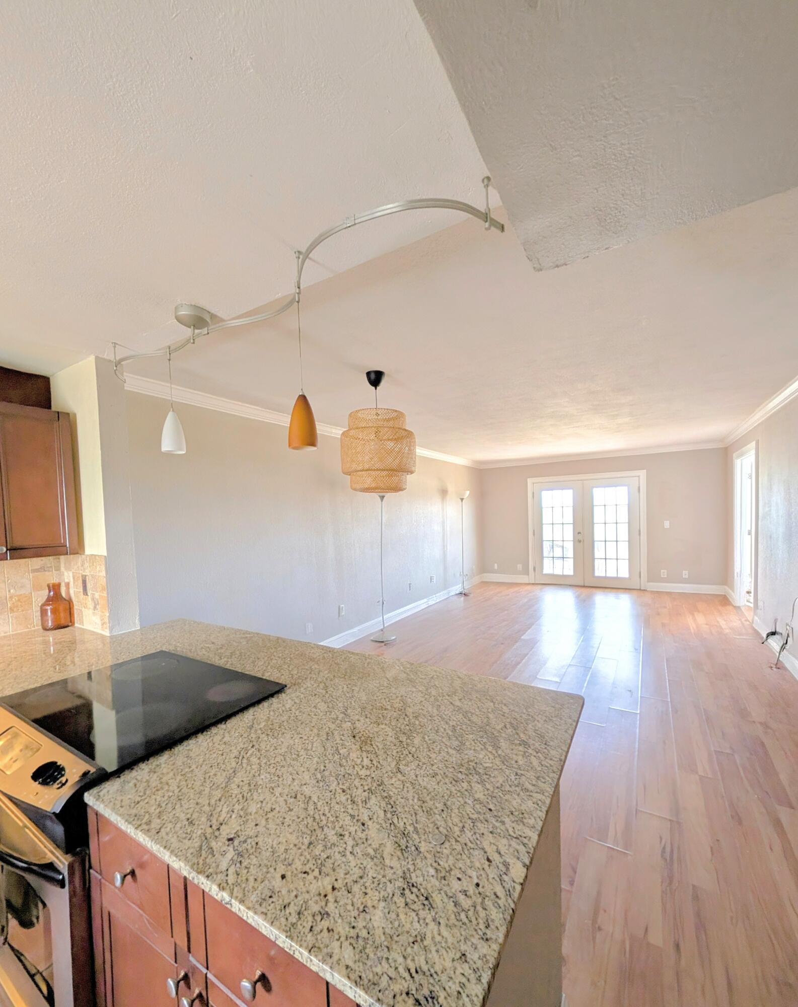 5700 Northwest 2nd Avenue, Unit 509 Boca Raton, FL 33487 - Photo 4 of 20 a kitchen with a sink and a wooden floor