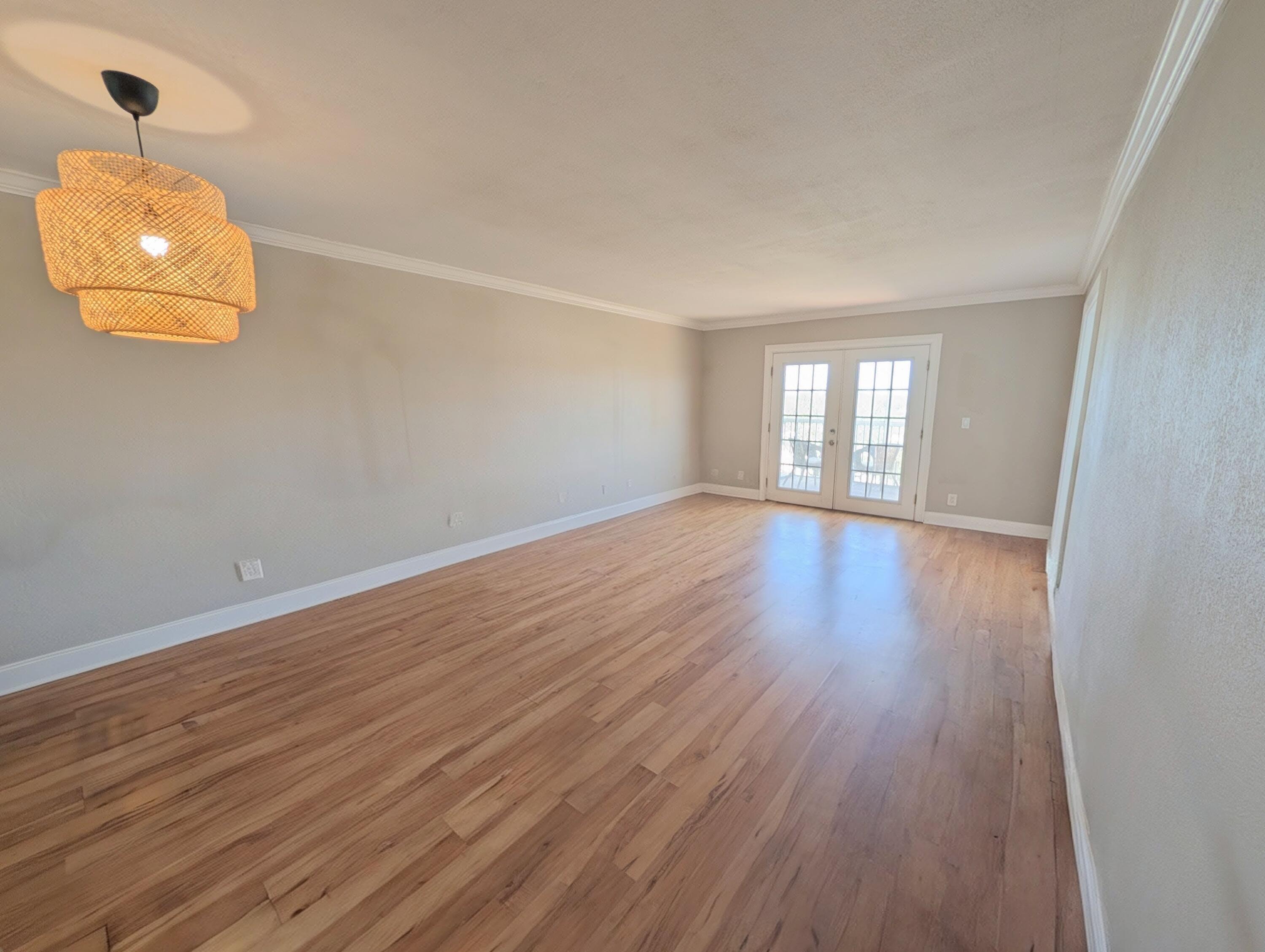 5700 Northwest 2nd Avenue, Unit 509 Boca Raton, FL 33487 - Photo 8 of 20 wooden floor in an empty room with a window
