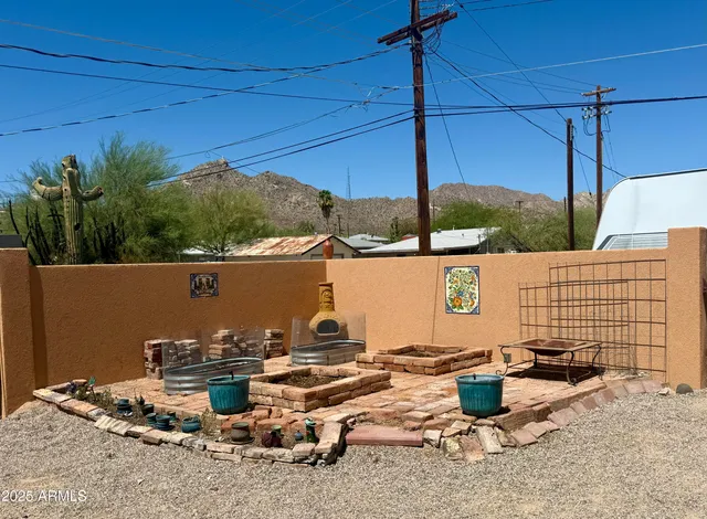 a view of swimming pool with outdoor seating