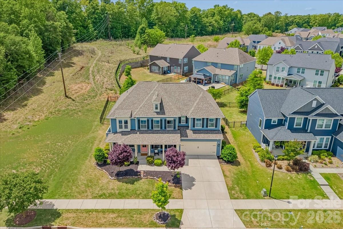 1135 Weir Court Fort Mill, SC 29708 - Photo 40 of 44 an aerial view of a house with swimming pool and outdoor seating