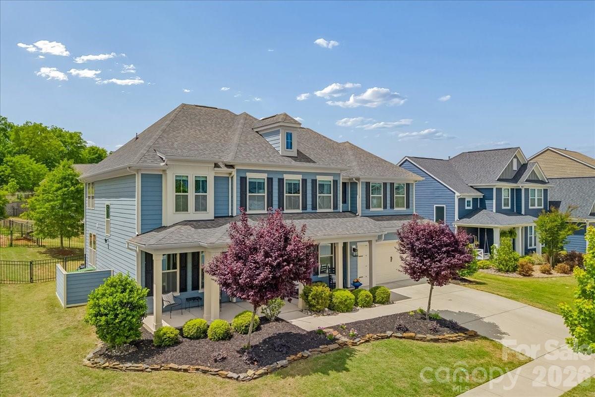 1135 Weir Court Fort Mill, SC 29708 - Photo 6 of 44 a front view of house with yard and trees around