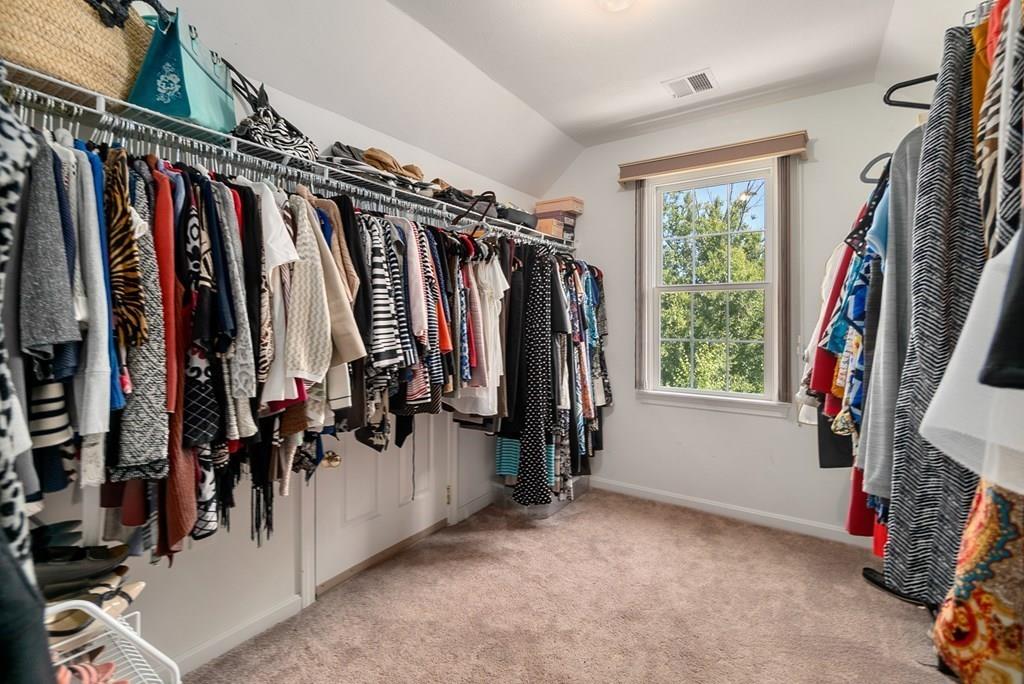 300 Crownshield Avenue Uxbridge, MA 01569 - Photo 18 of 29 a view of walk in closet with clothes