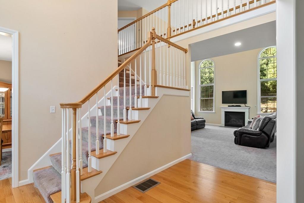 300 Crownshield Avenue Uxbridge, MA 01569 - Photo 2 of 29 a view of entryway livingroom and hall with wooden floor