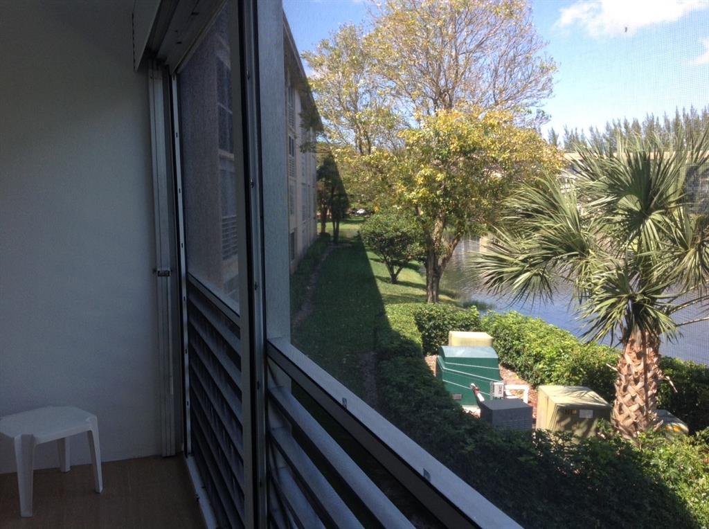 1805 Eleuthera Point, Unit J2 Coconut Creek, FL 33066 - Photo 15 of 22 a view of balcony