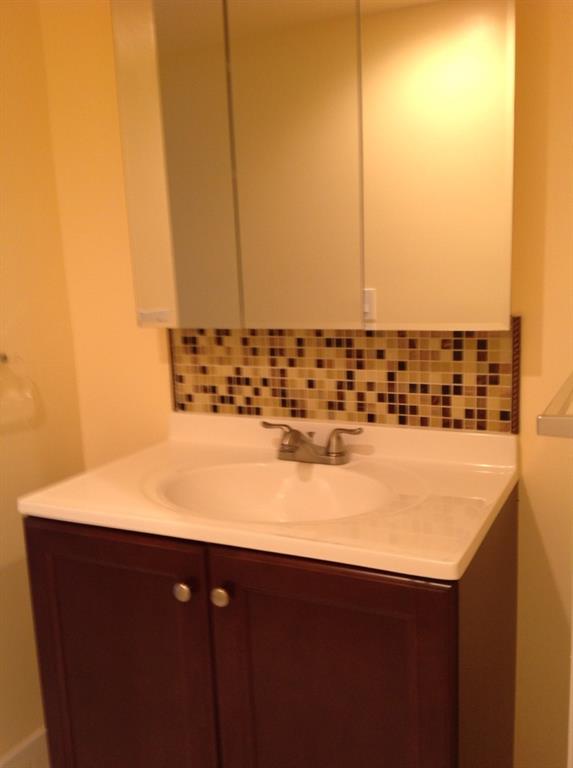 1805 Eleuthera Point, Unit J2 Coconut Creek, FL 33066 - Photo 17 of 22 a view of sink and microwave