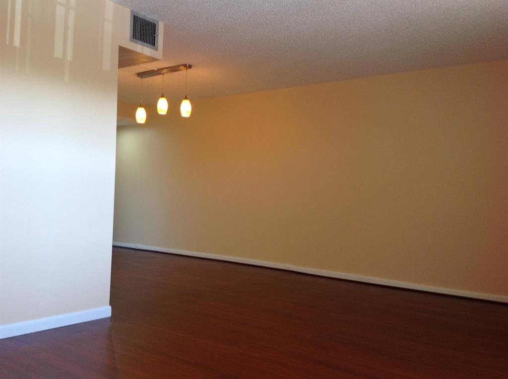 1805 Eleuthera Point, Unit J2 Coconut Creek, FL 33066 - Photo 5 of 22 a view of an empty room and window