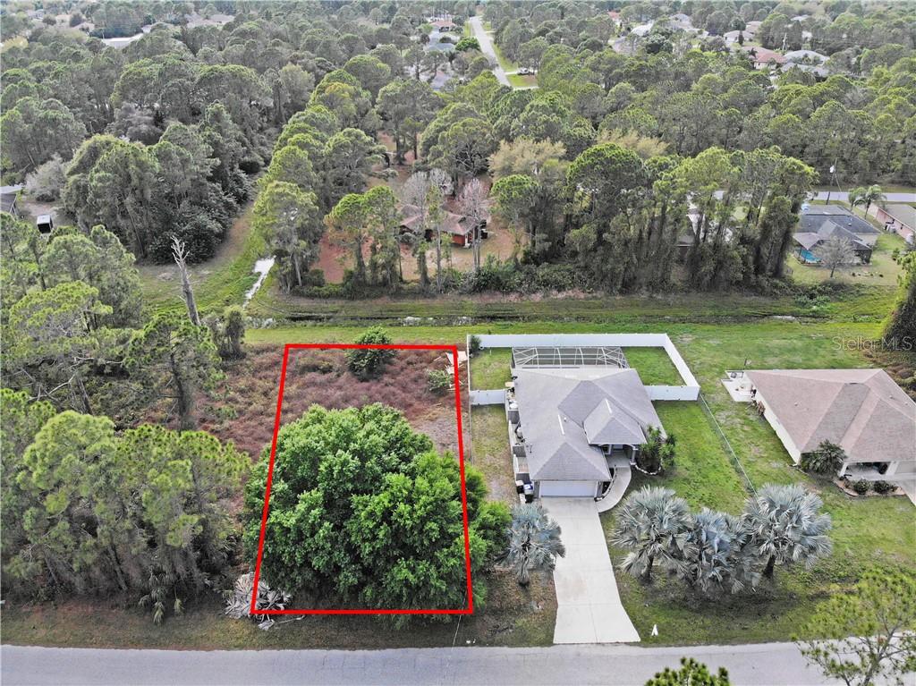 7539 Battalla Road North Port, FL 34291 - Photo 1 of 1 3 BEDROOM, 2 BATH HOME WITH FENCED IN YARDS PLUS BONUS VACANT LOT NEXT DOOR!!