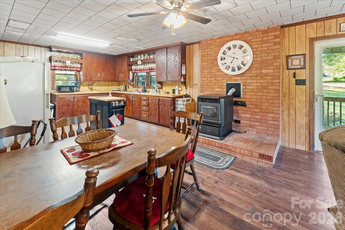 12282 Coyle Road Stanfield, NC 28163 - Photo 6 of 24 a view of a dining room with furniture window and wooden floor