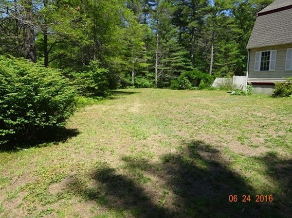 8 Mayflower Lane Rochester, MA 02770 - Photo 14 of 19 a view of backyard with garden
