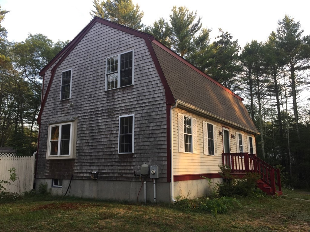 8 Mayflower Lane Rochester, MA 02770 - Photo 3 of 19 a view of a house with a yard