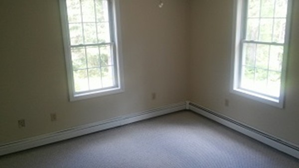 8 Mayflower Lane Rochester, MA 02770 - Photo 9 of 19 an empty room with a window