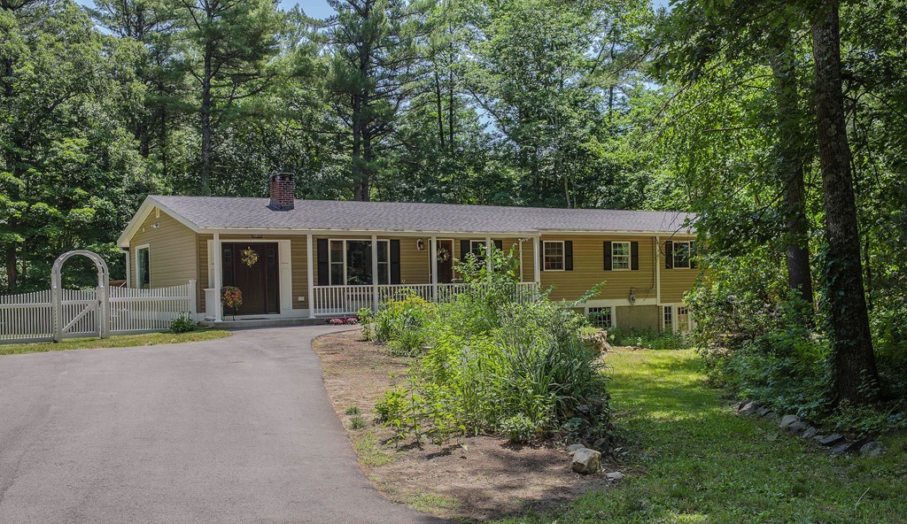 341 Main Street Boxford, MA 01921 - Photo 1 of 30 a front view of house with yard and green space