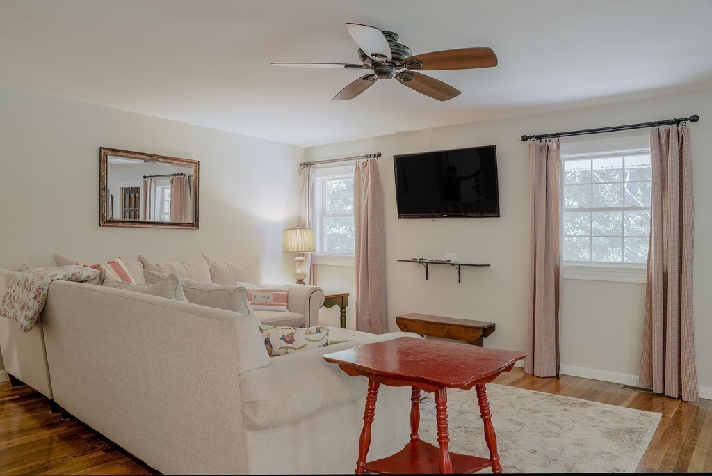 341 Main Street Boxford, MA 01921 - Photo 15 of 30 a living room with furniture and a flat screen tv