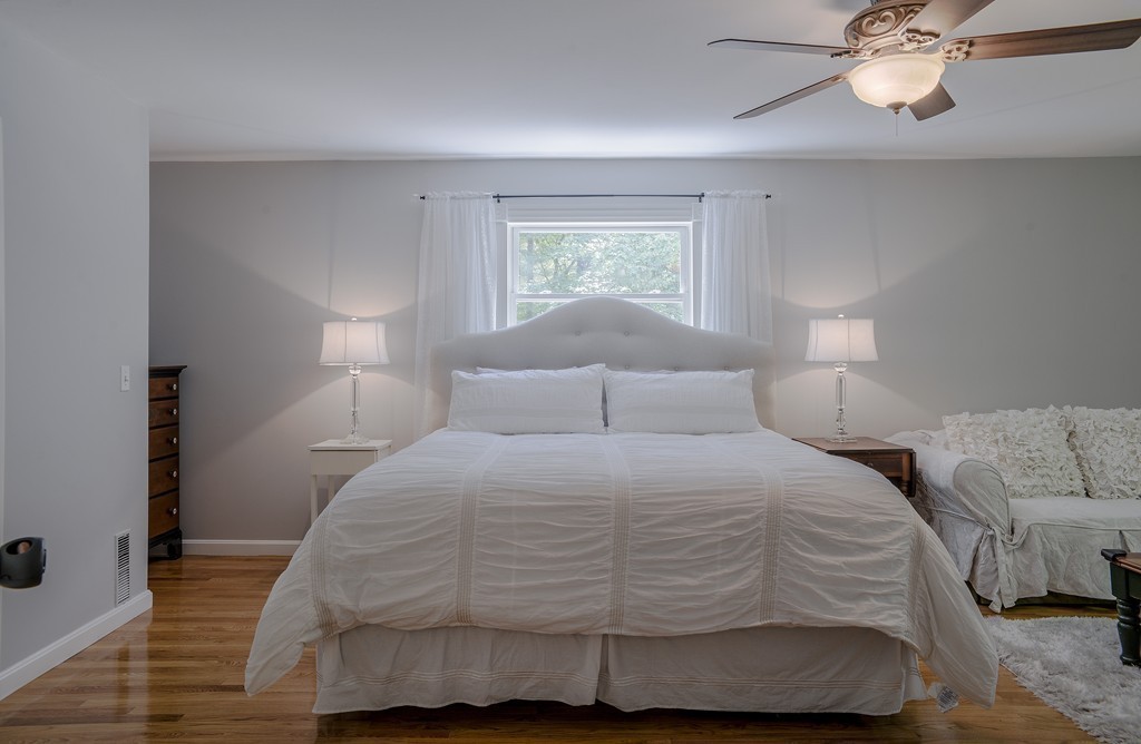 341 Main Street Boxford, MA 01921 - Photo 20 of 30 a bedroom with a bed and window