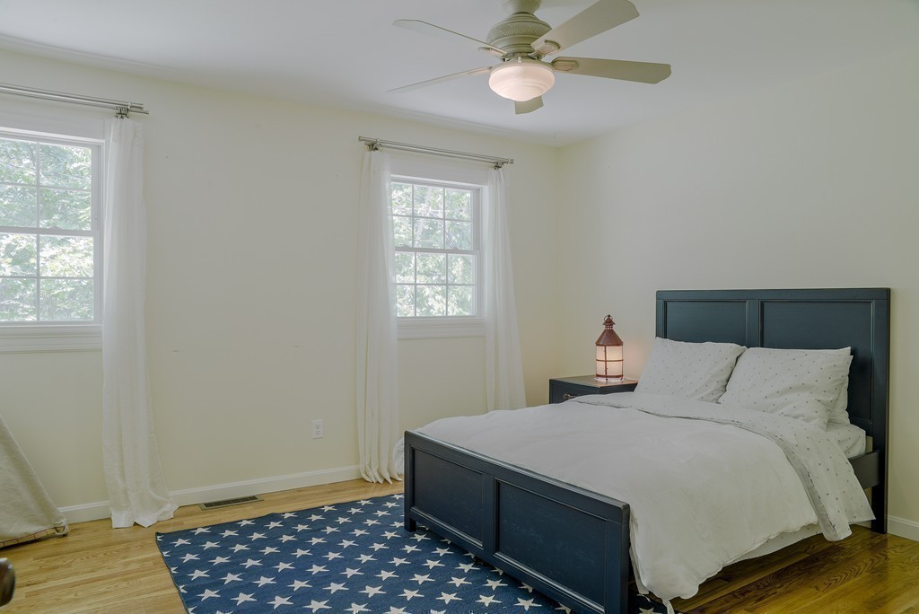 341 Main Street Boxford, MA 01921 - Photo 21 of 30 a bedroom with a bed and a window