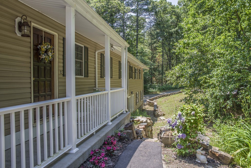 341 Main Street Boxford, MA 01921 - Photo 26 of 30 a view of a pathway of a house with wooden fence