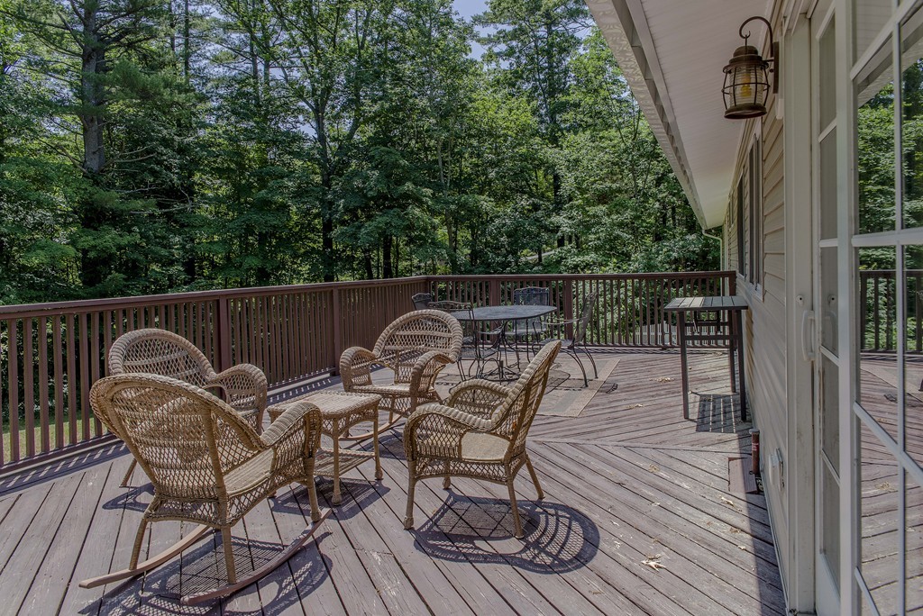341 Main Street Boxford, MA 01921 - Photo 30 of 30 a view of a chairs and table on the deck