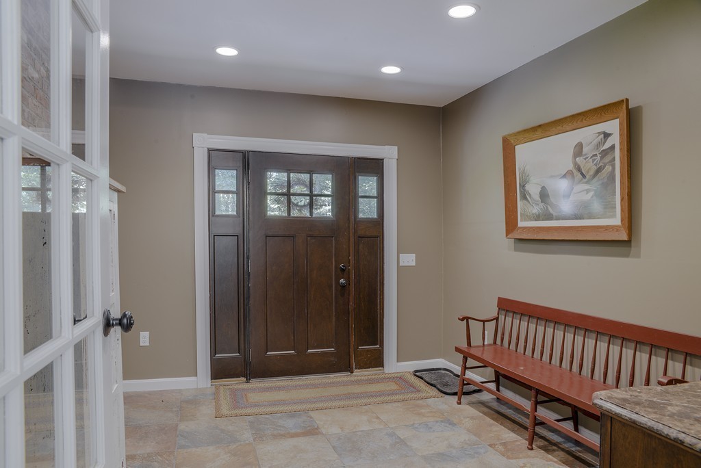 341 Main Street Boxford, MA 01921 - Photo 4 of 30 an empty room with windows & a ceiling fan