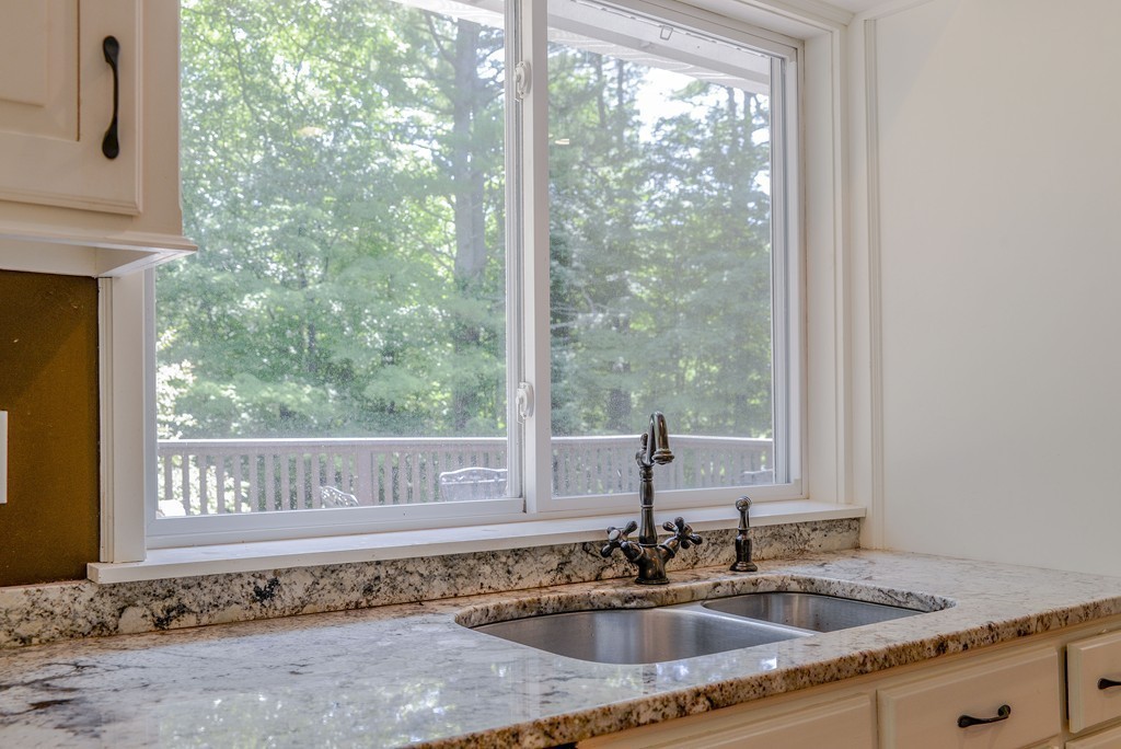 341 Main Street Boxford, MA 01921 - Photo 10 of 30 a kitchen with sink window and wooden floor