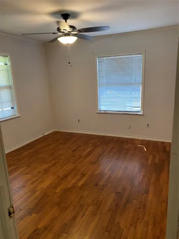 a view of a room that has a window in it