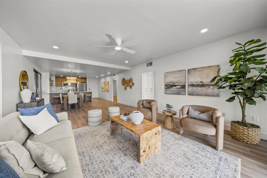 2500 Torrey Pines Road, Unit 305 La Jolla, CA 92037 - Photo 20 of 48 a living room with furniture and a potted plant
