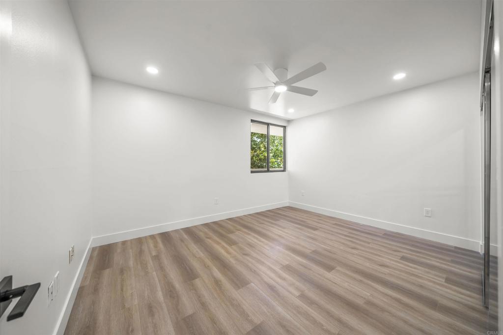 2500 Torrey Pines Road, Unit 305 La Jolla, CA 92037 - Photo 21 of 48 wooden floor in an empty room with a window