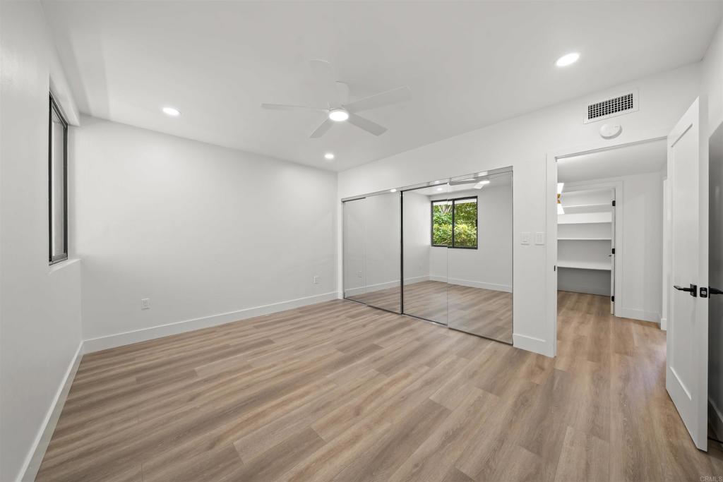 2500 Torrey Pines Road, Unit 305 La Jolla, CA 92037 - Photo 22 of 48 a view of empty room with wooden floor