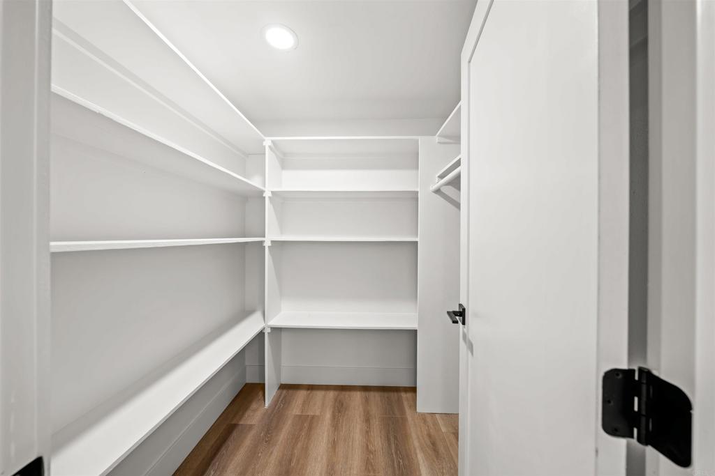 2500 Torrey Pines Road, Unit 305 La Jolla, CA 92037 - Photo 24 of 48 a view of walk in closet with empty racks