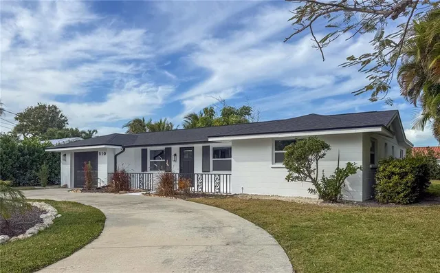 front view of a house with a patio