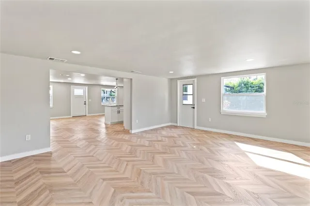 a view of an empty room and window