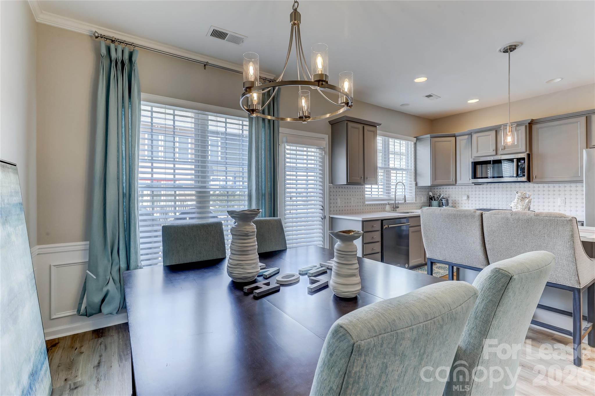 905 Lyndley Drive Fort Mill, SC 29708 - Photo 12 of 42 a living room with furniture flat screen tv and window