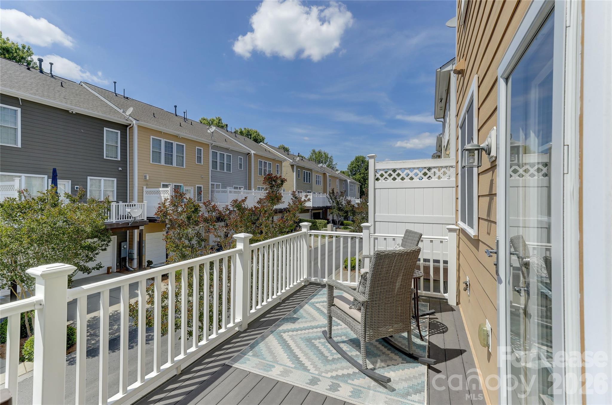 905 Lyndley Drive Fort Mill, SC 29708 - Photo 23 of 42 a view of a chair and table in the balcony