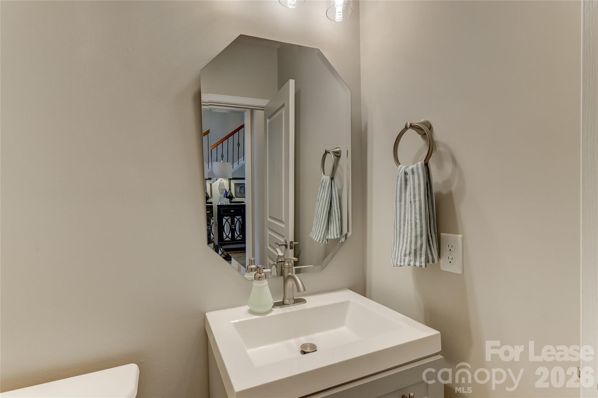 905 Lyndley Drive Fort Mill, SC 29708 - Photo 24 of 42 a bathroom with a sink and a mirror