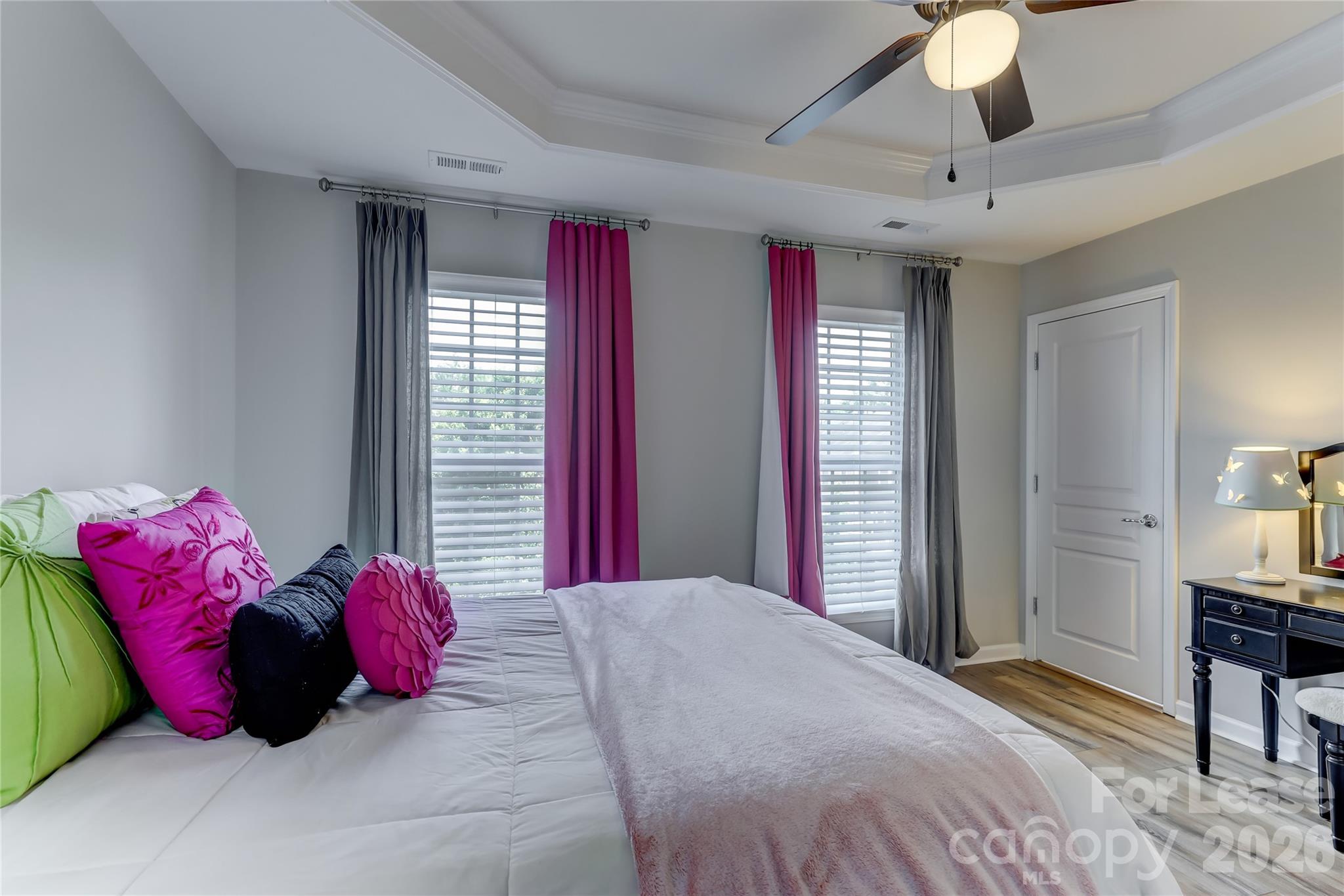 905 Lyndley Drive Fort Mill, SC 29708 - Photo 27 of 42 a bedroom with a bed and a chandelier