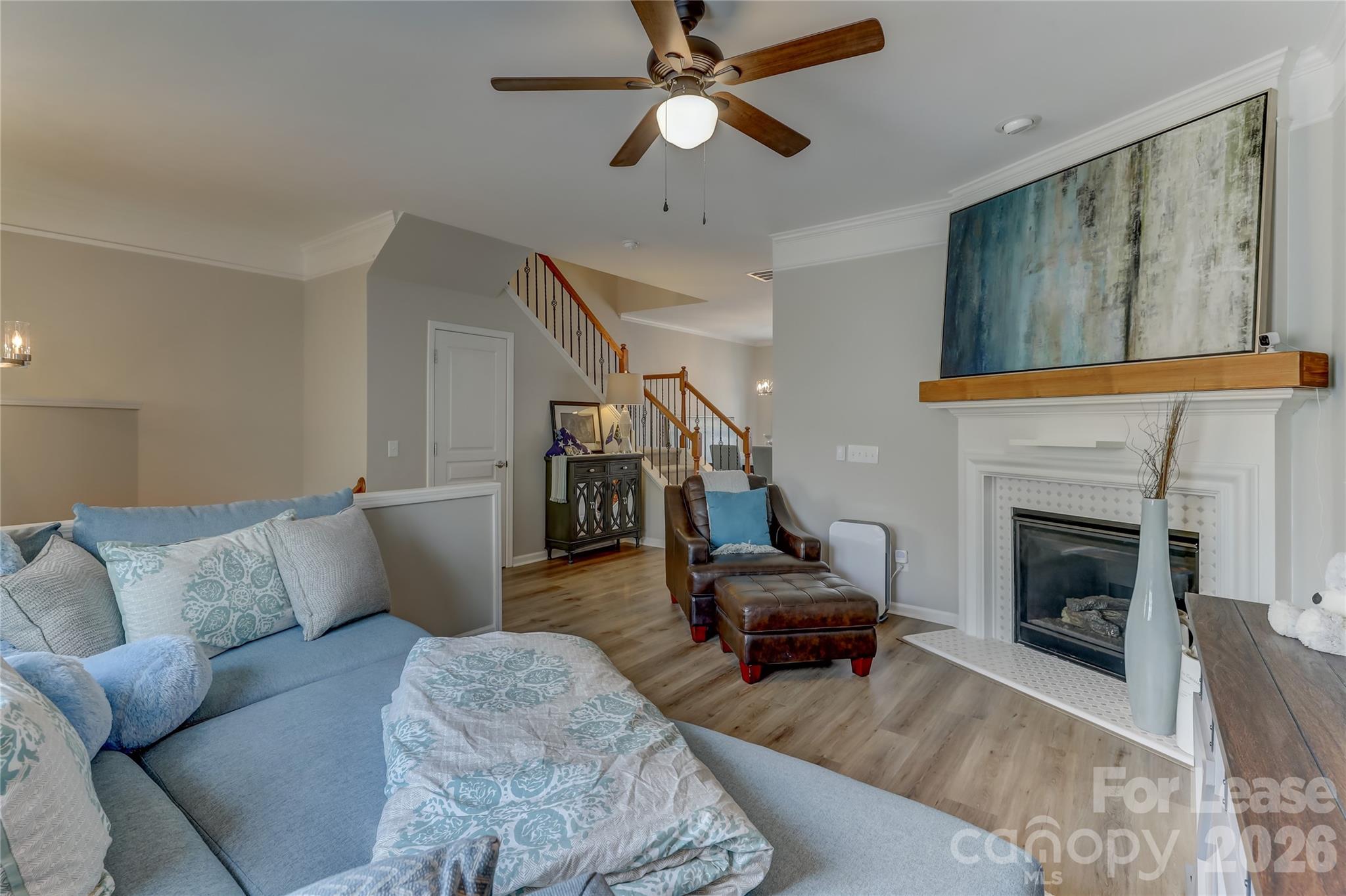 905 Lyndley Drive Fort Mill, SC 29708 - Photo 9 of 42 a living room with furniture and a fireplace