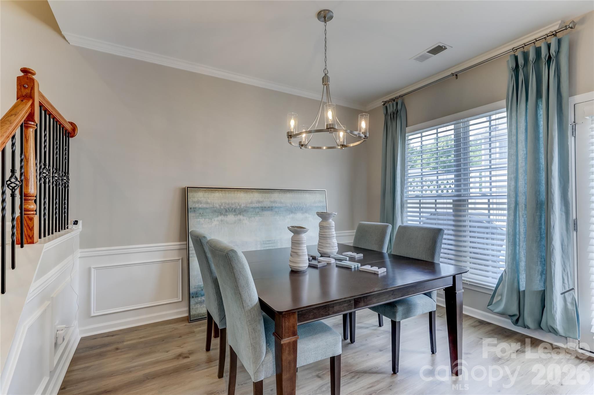 905 Lyndley Drive Fort Mill, SC 29708 - Photo 10 of 42 a view of a dining room with furniture window and wooden floor