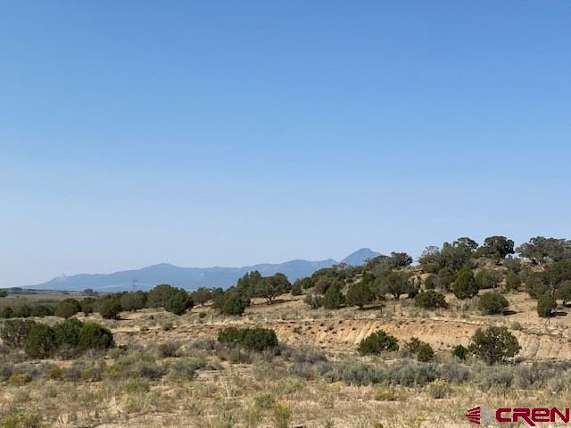 a view of mountain view with mountains in the background