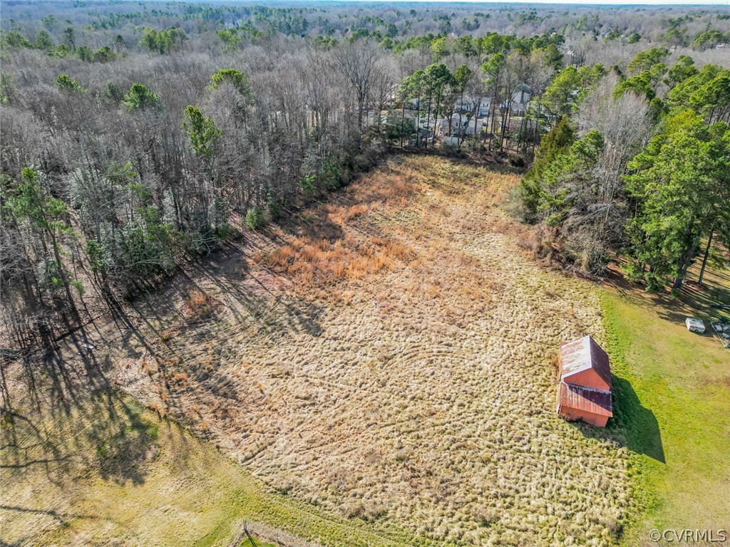 9527 Reams Road Chesterfield, VA 23236 - Photo 1 of 7 a view of a yard with plants