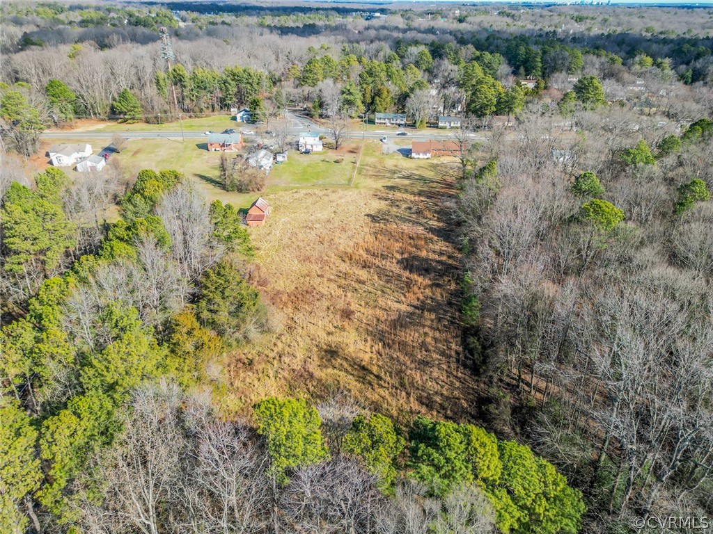 9527 Reams Road Chesterfield, VA 23236 - Photo 2 of 7 a view of a lake with beach