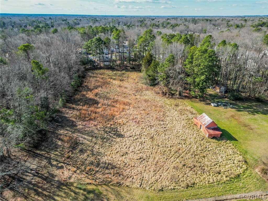 9527 Reams Road Chesterfield, VA 23236 - Photo 6 of 7 a view of a yard with wooden fence