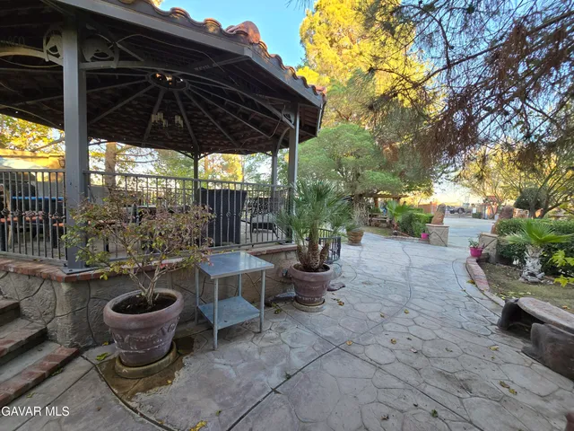 a bedroom with bed and a window