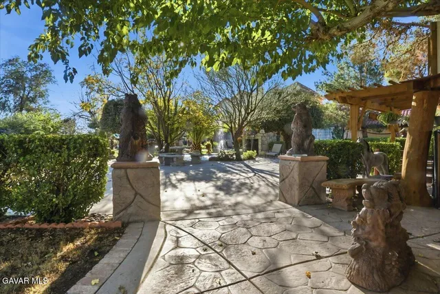a view of a patio with swimming pool