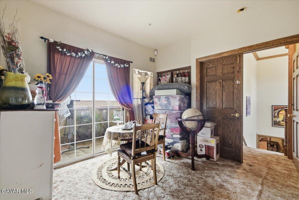 44005 90th Street East Lancaster, CA 93535 - Photo 94 of 146 a work room with furniture and a large window