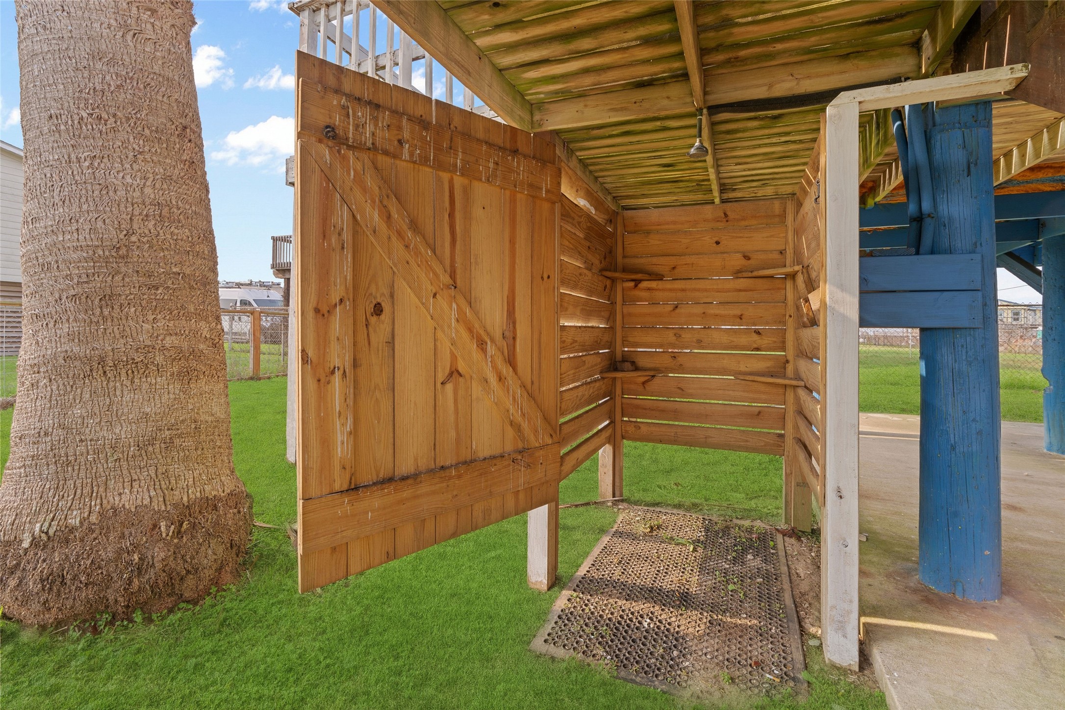 416 Seabean Street Surfside Beach, TX 77541 - Photo 6 of 27 a view of a pathway of a building