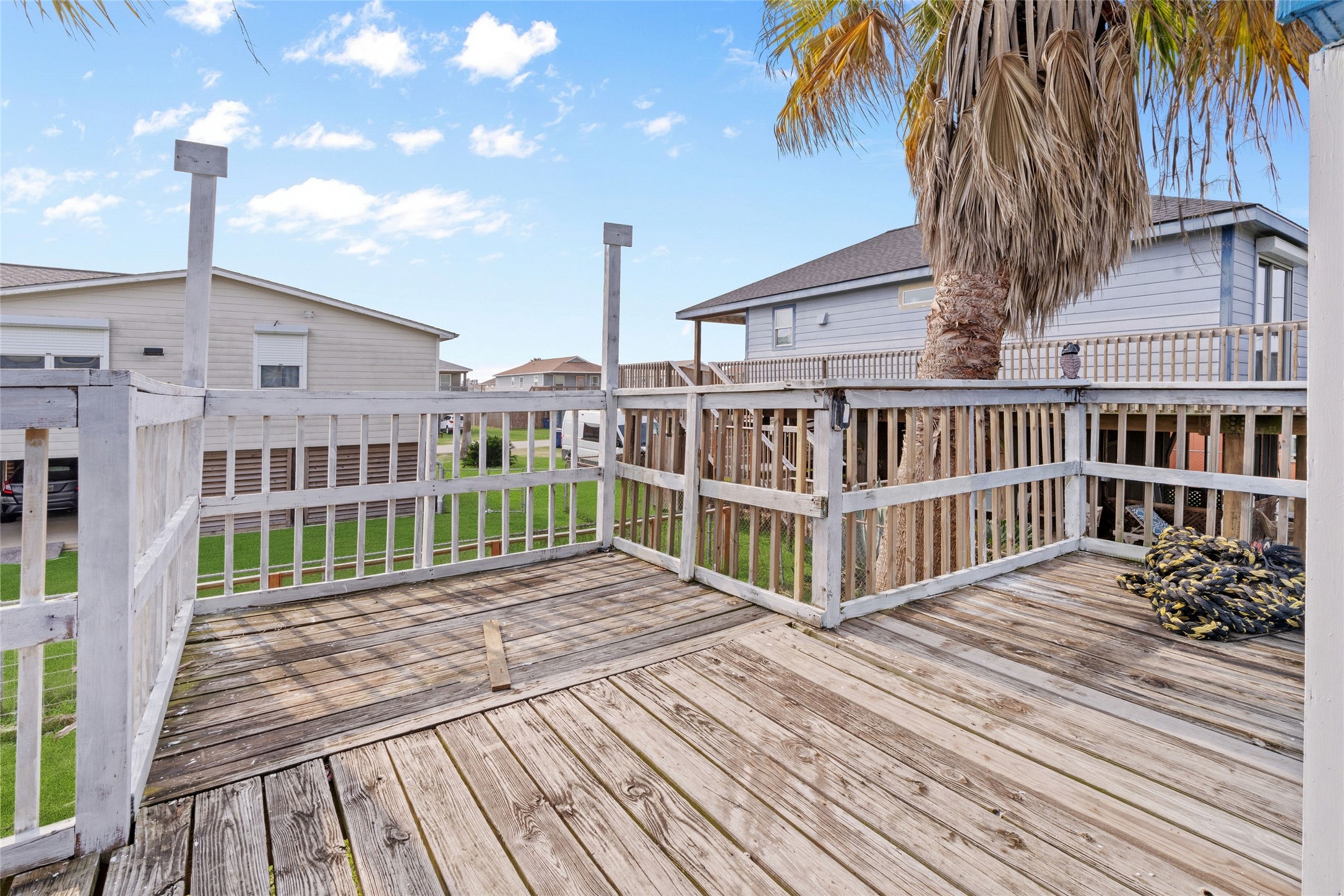 416 Seabean Street Surfside Beach, TX 77541 - Photo 7 of 27 a view of a house with a patio