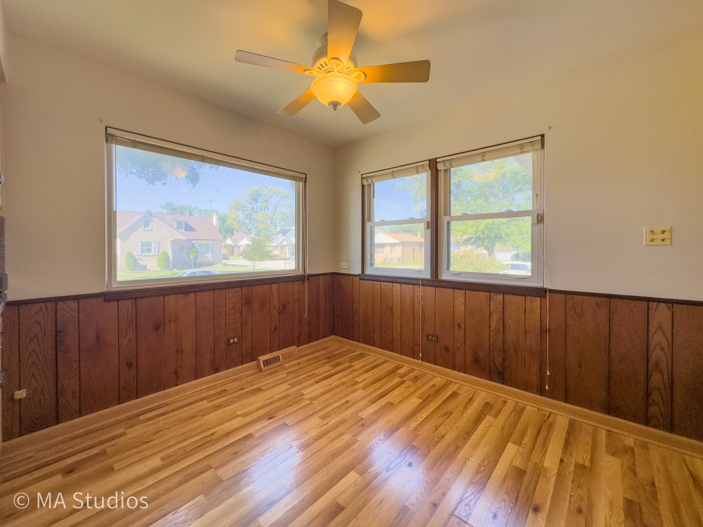8636 40th Street Lyons, IL 60534 - Photo 14 of 50 a view of a room with wooden floor and a window