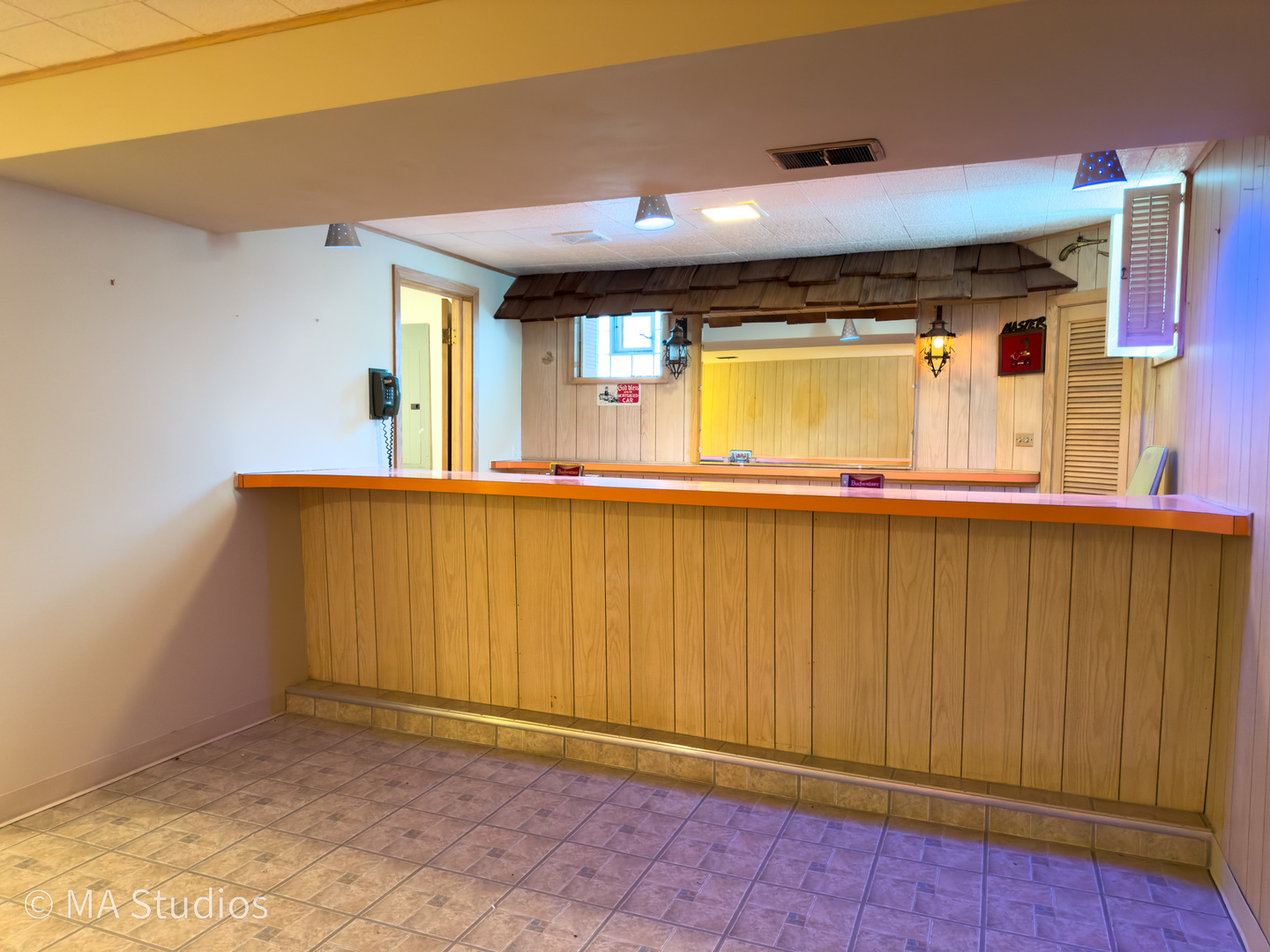 8636 40th Street Lyons, IL 60534 - Photo 33 of 50 a view of a porch with wooden floor and a gate