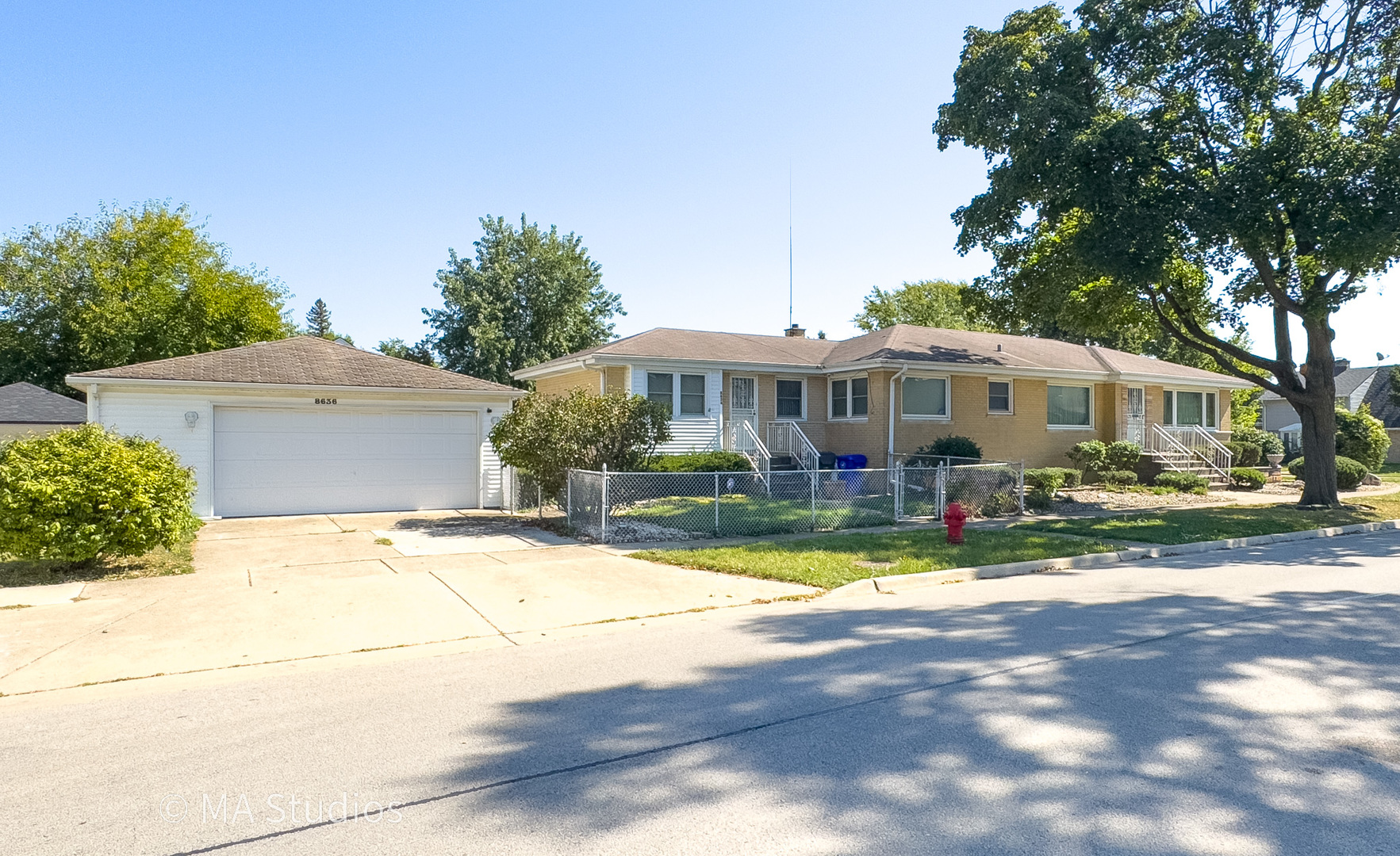 8636 40th Street Lyons, IL 60534 - Photo 4 of 50 a view of a house with swimming pool and sitting area