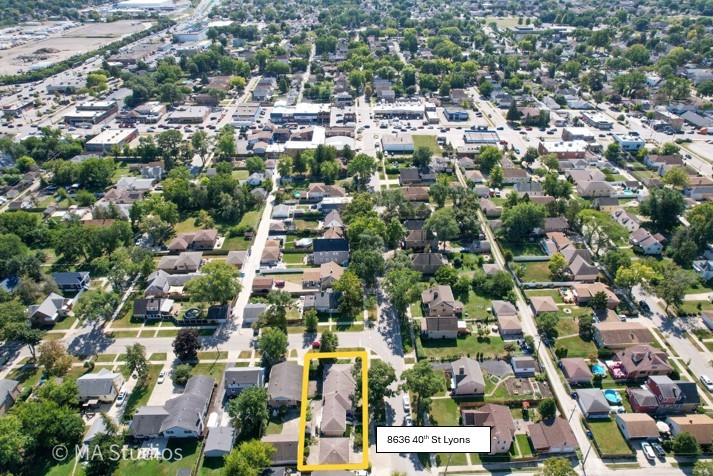 8636 40th Street Lyons, IL 60534 - Photo 49 of 50 an aerial view of residential houses with city view